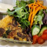 Quiche & Greens · Quiche slice of your choice (as available) with a side salad containing mixed greens, cucumb...