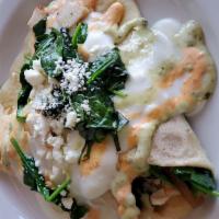 Chicken Florentine Galette · Grilled chicken, spinach, caramelized onions, roasted red peppers, feta cheese, Béchamel sau...