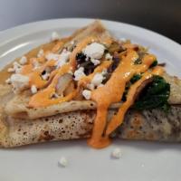 Boulder Galette · Sauteed mushrooms, caramelized onions, spinach, Haystack goat cheese, sun-dried tomato garni...