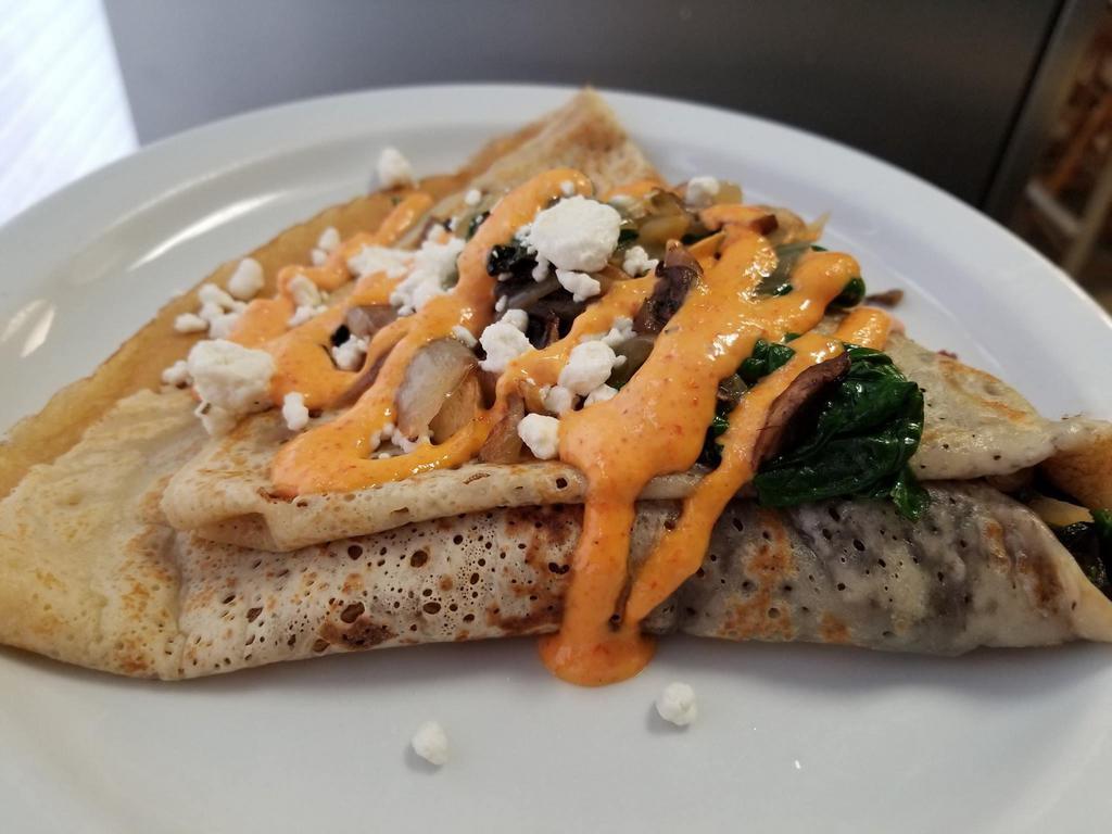 Boulder Galette · Sauteed mushrooms, caramelized onions, spinach, Haystack goat cheese, sun-dried tomato garnish, red pepper mayo.