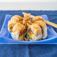 Weissabi Roll · Tuna, salmon, avocado, cucumber, mango topped with spicy kani and crispy onions