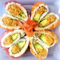 Sweetheart Roll · Spicy salmon, crunch, avocado, wrapped with tuna and salmon.