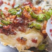 Brickhouse Baked Oysters · 6 pieces. Oysters on the half shell topped with Parmesan cheese, bacon, and jalapenos. When ...