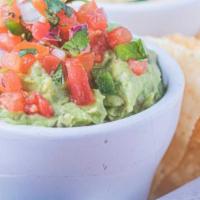 Triple Dip · House-made guacamole, house-made salsa, and house-made queso served with fresh tortilla chip...