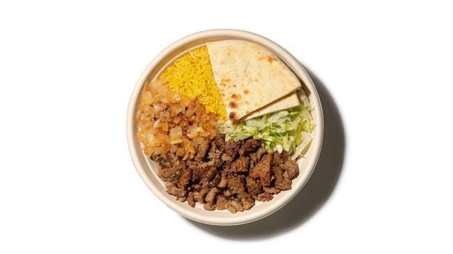 Gyro Platter · Rotisserie Juicy! Gyro, served over your choice of basmati rice, lettuce or Green Blast®, and also served with sautéed onions, lettuce & slice of pita bread (Note: pita bread contains gluten)