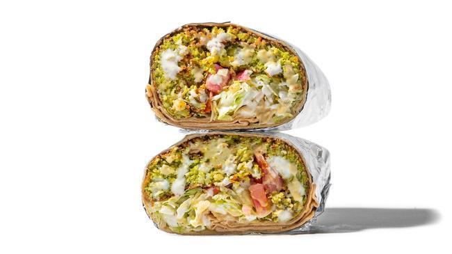Falafel Wrap · Plant Based Falafel made w/ chickpeas, parsley, onions, cilantro, serrano peppers, garlic & tahini served in a wrap with lettuce, tomato, pickled onions, white sauce & tahini. (Note: tahini contains sesame)