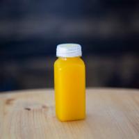 Organic Tumeric and Orange · Fresh wellness shot made frof organic turmeric and oranges. Helps with inflamation, pain, re...