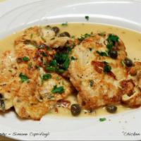 Chicken Piccata Dinner Special · In lemon and butter sauce with capers. 
