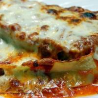 Lasagna · With meat, ricotta and mozzarella. 