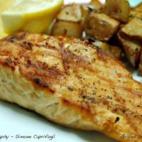 Grilled Salmon · With fresh herbs, spices and lemon wedges. Served with vegetables or roasted potatoes. 