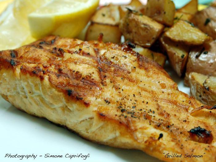 Grilled Salmon · With fresh herbs, spices and lemon wedges. Served with vegetables or roasted potatoes. 