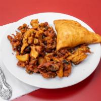 31. Vegetable Samosa · Deep fried pastry stuffed with vegetables.