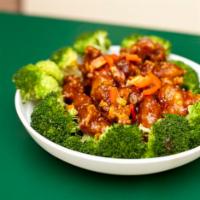 General Tso's Chicken · Chunks boneless chicken sauteed in the hunan sauce and sauteed broccoli with white rice. Hot...
