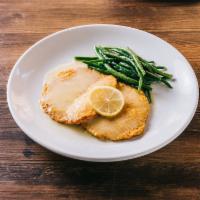 Vitello Martini Dinner · Veal scaloppine in Parmigiano, white wine-lemon sauce and French beans.