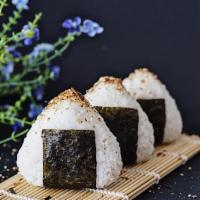 Eel Onigeri · 2 Pc Onigeri.Eel and oshinko inside (Japanese yellow raddish) wrapped with sushi rice and se...