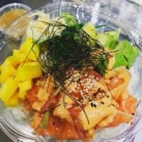 Salmon Poke Bowl · mango,cucumber,seaweed salad,bonito furikake over the rice with Poke sauce and spicy mayo on...