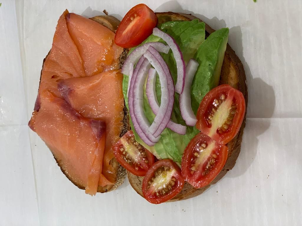 Superior Avocado Toast · Avocado On Rye Toast With Smoked Salmon, Cherry Tomatoes And Red Onions