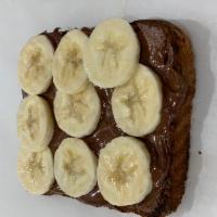 Delicous Nutella Banana Toast · Nutella On White Toast With Banana