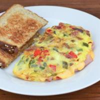 Western Omelette · Served w/ Scrambled Eggs, Ham, Bell Peppers & Onions.  Served w/ Home Fries & Toast.