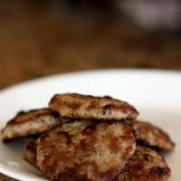 Side of Sausage Patty · Finely minced meat formed into a patty and cooked. 