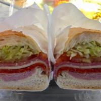 Italian Combo No. 2 Sandwich · Ham, Salami, Pepperoni, Provolone Cheese, Lettuce Tomatoes, & Italian Dressing.
