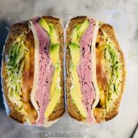 Boar's Head Deluxe Ham Sandwich · Cheese, Lettuce and Tomatoes.