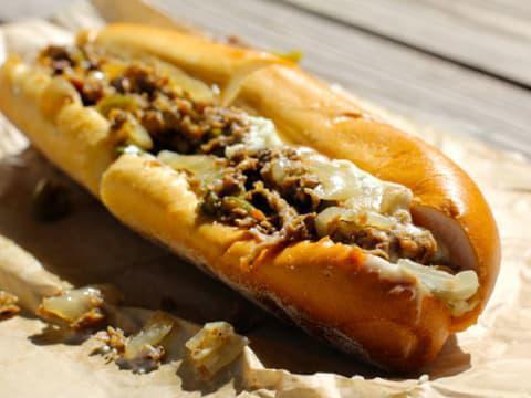 Philly Cheesesteak · Ground Thinly Sliced Beef Steak w/ Bell Peppers, Onions and your choice of melted Cheese.