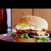 555 Burger · Cheese Burger With A Fried Egg, Lettuce, Tomato, Fried Onions And Chipotle Mayo