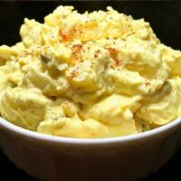 Potato Salad · Country style scratch made red potato salad, dressed with a peppery and pickle-y mayo and Di...