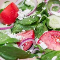 Spinach Salad · Fresh spinach, red onion, bacon bits, tomatoes, mushrooms and cucumbers. Served with garlic ...