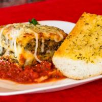Beef Lasagna · Layers of pasta, beef and three cheeses topped with tomato sauce. Served with garlic bread.