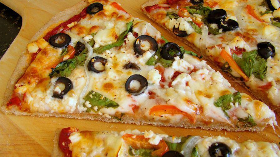 Mediterranean Pizza · Olive oil, gyro meat, tomato, red onion, pepperoncini, feta cheese and mozzarella cheese.