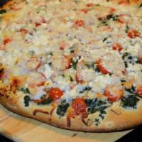 Spinach and Garlic Pizza · Olive oil, spinach, tomatoes, fresh garlic, feta and mozzarella cheese.