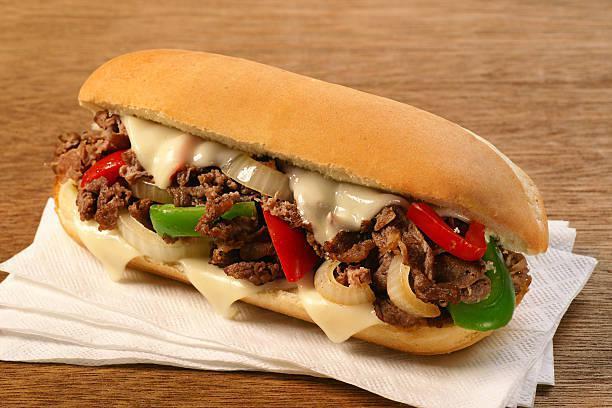 Philly Sub · Beef, bell pepper, onions, mayo, sauce and melted provolone. Served on choice of bread with chips. Sauce is a mix of mayo, olive oil, vinegar and spices.