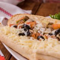 Veggie Delight Sub · Sauteed mushrooms, tomatoes, bell peppers, onions, black olives and banana peppers.  Served ...