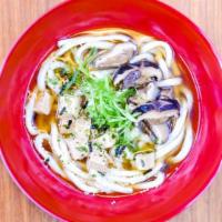 Miso Udon Soup  · Umami Dashi Miso broth, fresh udon noodles, crispy tou and scallions.