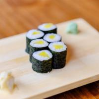 Shiko Maki Roll · Nori seaweed on the outside, seasoned rice, and pickled daikon radish inside.