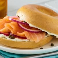 Nova Lox Sandwich · Plain bagel with cream cheese, sliced red onion and capers with smoked salmon and lox.