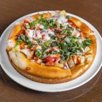 BBQ Chicken Pizza · Tangy BBQ sauce, roasted chicken breast, fresh basil, pineapple and onions. 