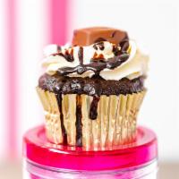 Chocolate Fudge Cupcake  · Decadent chocolate cupcake with vanilla buttercream and dark chocolate drizzle.