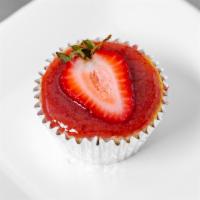 Mini Strawberry Cheesecake  · Decadent miniature cheesecake topped with fresh strawberry and sauce.