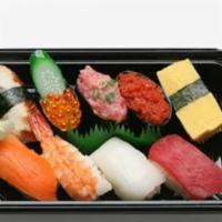 S-Nigiri Set · 9 pieces. Ahi, ika, salmon, shrimp, egg, unagi, negitoro, ikura, spicy ahi.