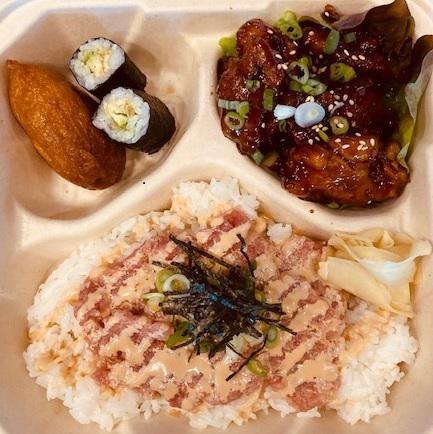 Aloha Bento · Spicy ahi, spicy mayo, nori, garlic chicken, green onion, sesame, lettuce, inari, shinko, sushi rice. Extra green onion & sesame for an additional charge. Spicy. 
