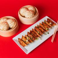 The Sharing Bundle · A shareable meal for 2-3 people. The Sharing Bundle contains 6 of our fluffy, steamed bao (2...