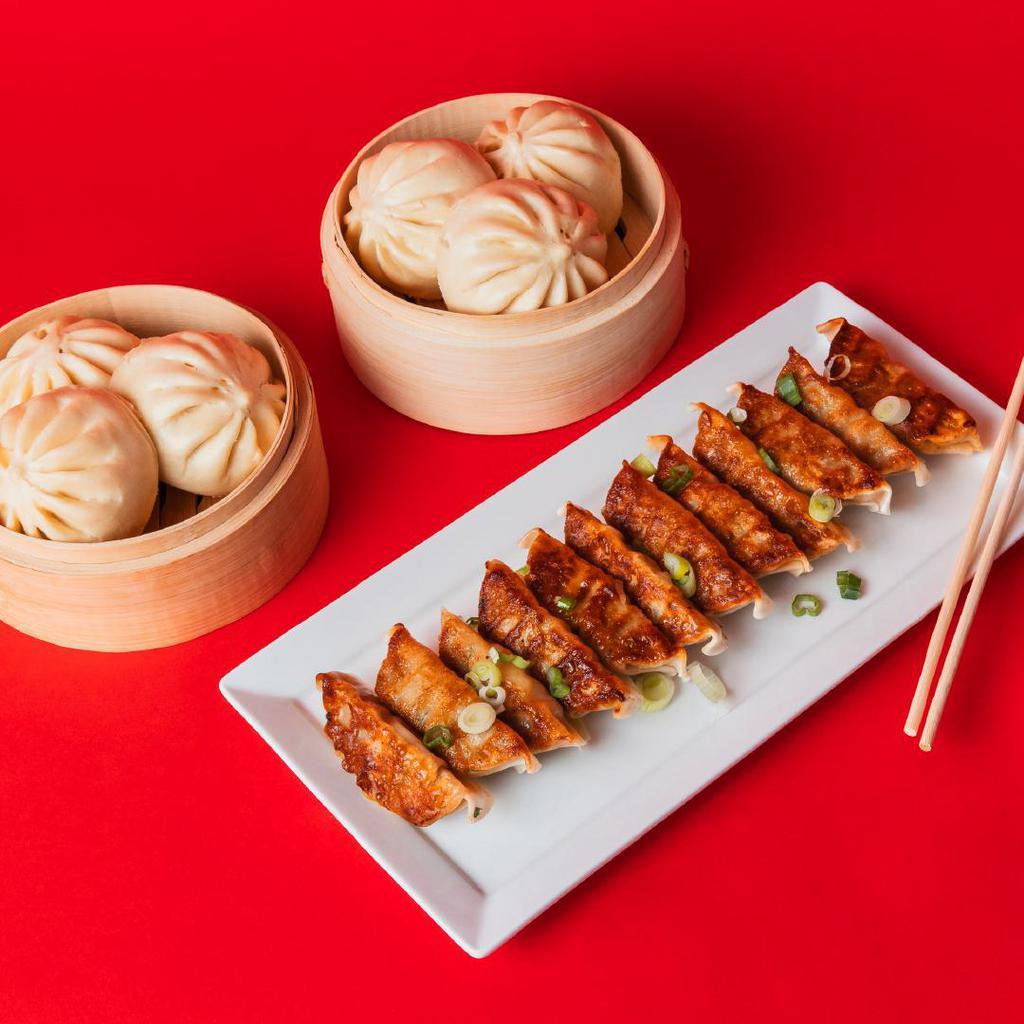 The Sharing Bundle · A shareable meal for 2-3 people. The Sharing Bundle contains 6 of our fluffy, steamed bao (2 Teriyaki Chicken, 2 BBQ Berkshire Pork, and 2 Spicy Mongolian Beef) and 12 pan-seared Ginger Chicken potstickers.