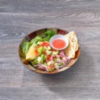 Olive House Salad · Mixed greens, tomato, cucumbers, red onions, olives served with warm pita served with house ...