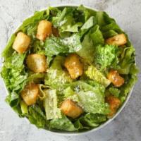 Caesar Salad · Fresh romaine lettuce and croutons dressed with Parmesan cheese with classic Cesar dressing.
