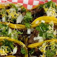 3 Tri-Tip Tacos Plate · 3 Tri-Tip tacos made with yellow corn tortillas, topped with diced bbq tri-tip, diced onions...