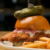 Nashville Screamin' Hot Chicken Sandwich · Buttermilk fried chicken breast doused in Nashville sauce and loaded with jalapeno slaw, ran...