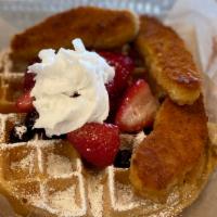 Chick -N & Waffles · Plant Based Chick -N and Waffles, served with fruit toping and house syrup. 
